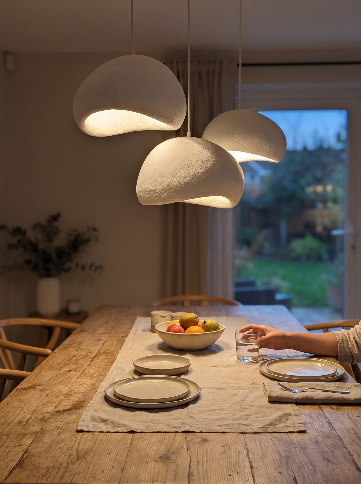Handmade Nordic chandelier sized to fit the space